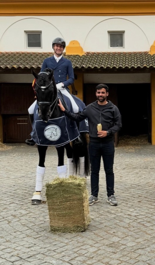 João with an Olympic dressage rider and a bale of Prime Hay